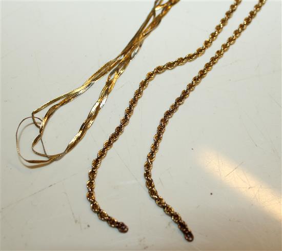 Three 14K gold chains, one with pearl pendant, another 3-colour & a 9ct gold chain(-)